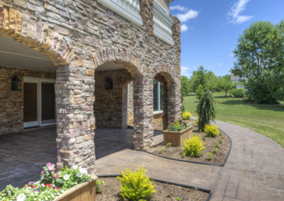 Side yard view with arches